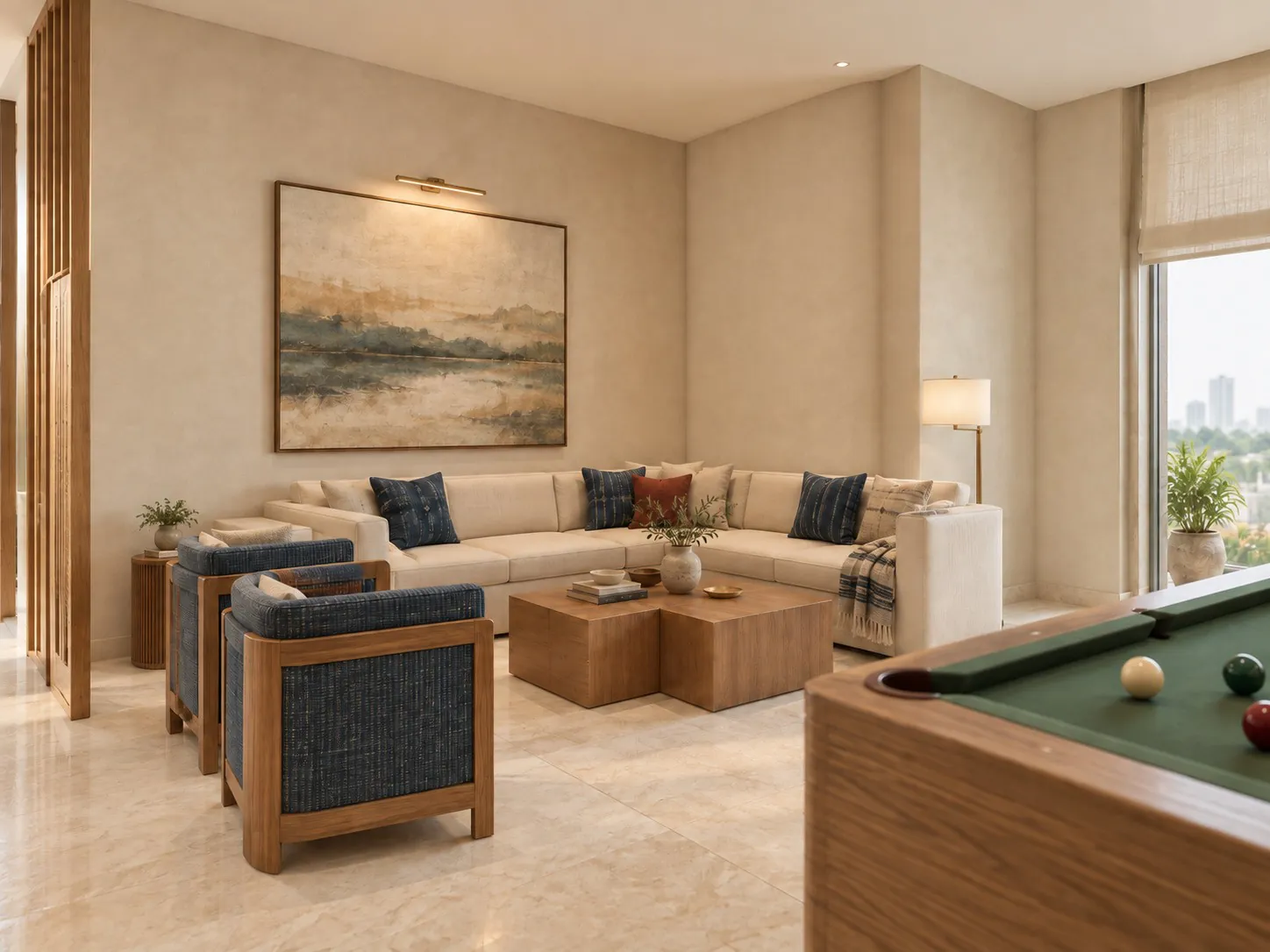 The same lounge in a contemporary Indian palette with indigo upholstery and a landscape painting