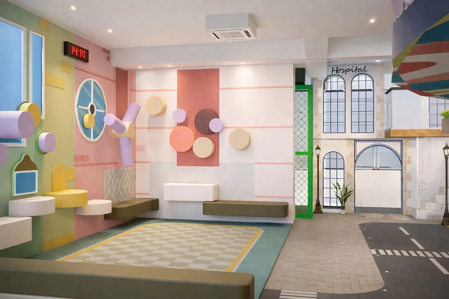 Soft play room with padded wall discs, low benches and a cushioned floor mat