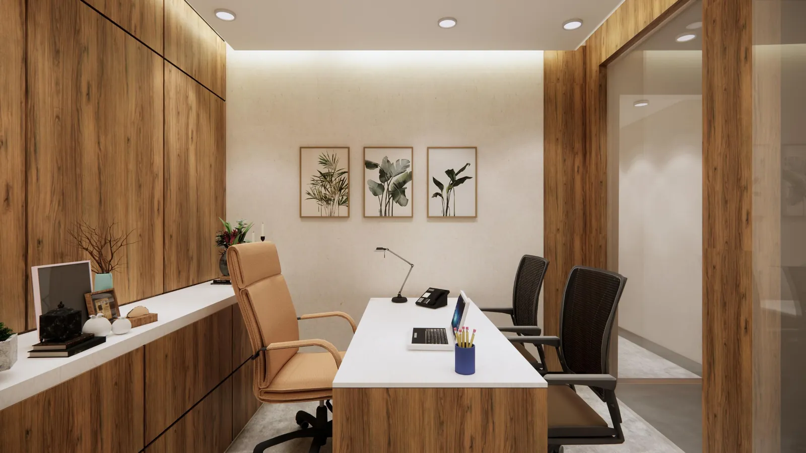 MD cabin from the door with a low credenza, framed prints and a glazed partition