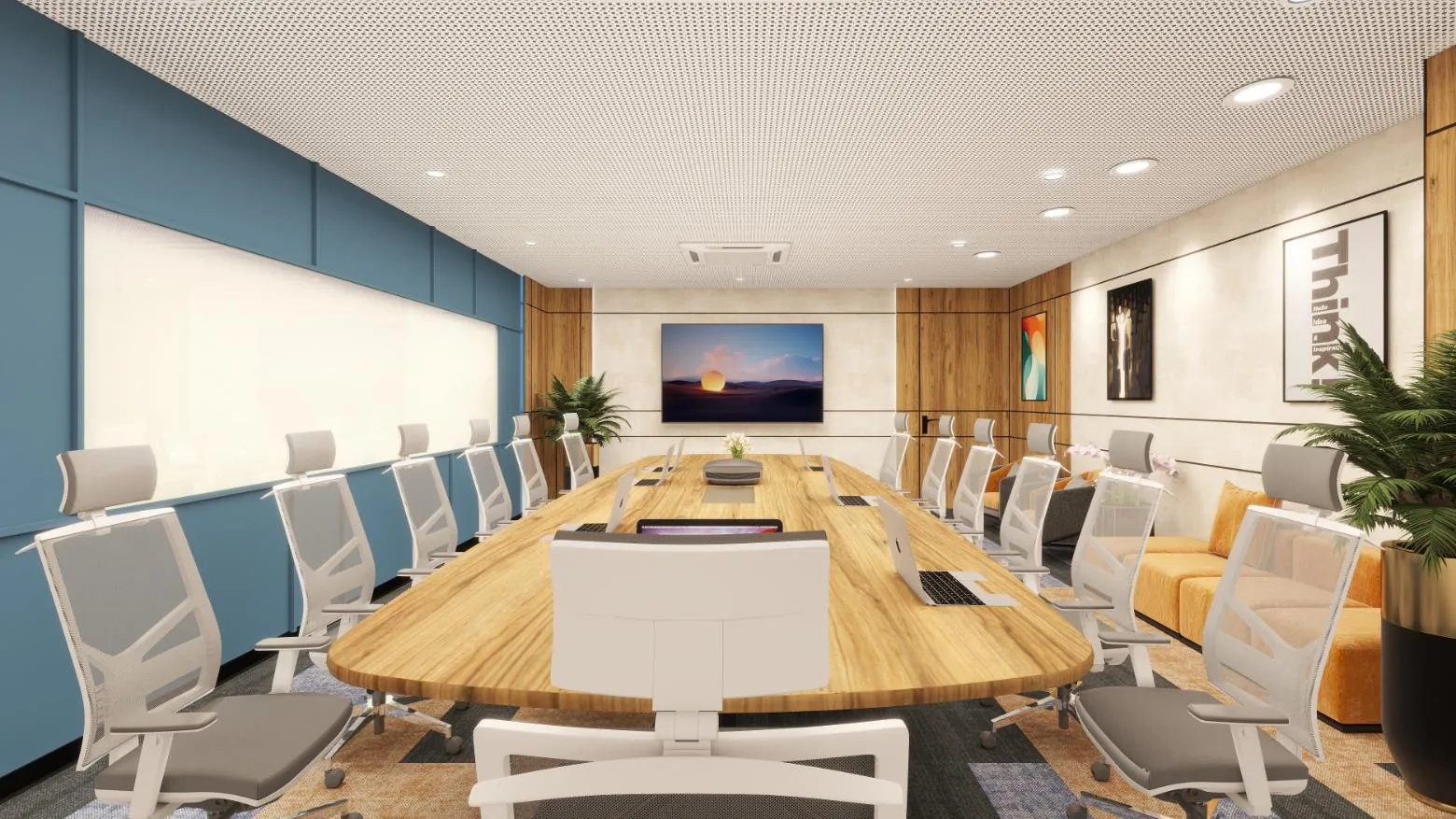 Board room with a long timber table, acoustic ceiling and a blue panelled wall