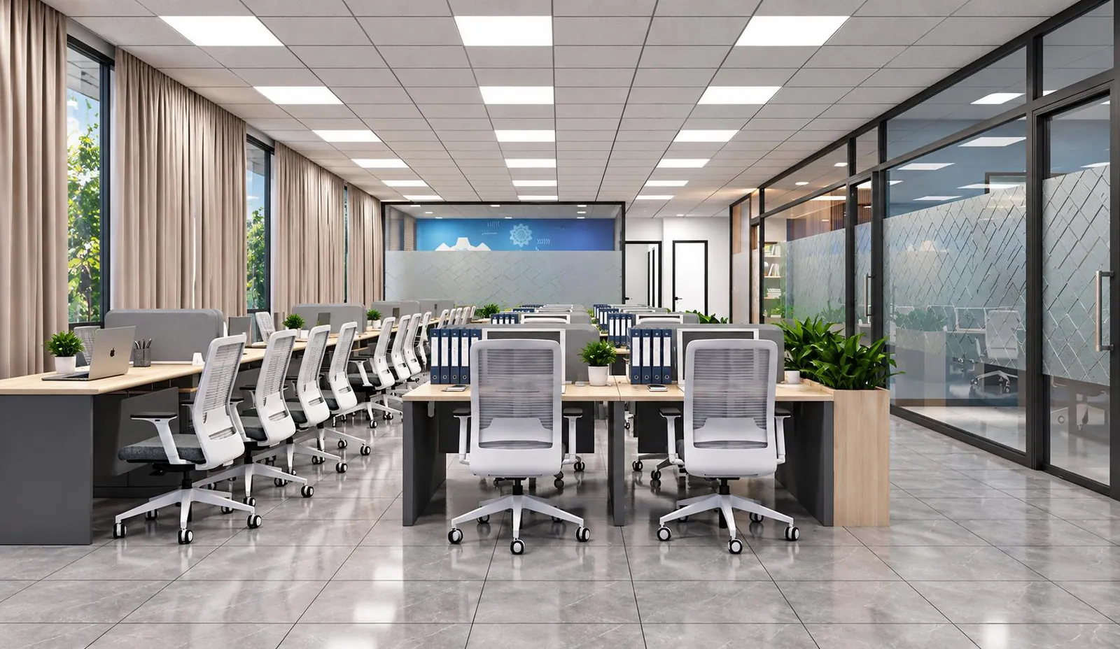 Open-plan office workstations in a long bay with glazed cabins along one side