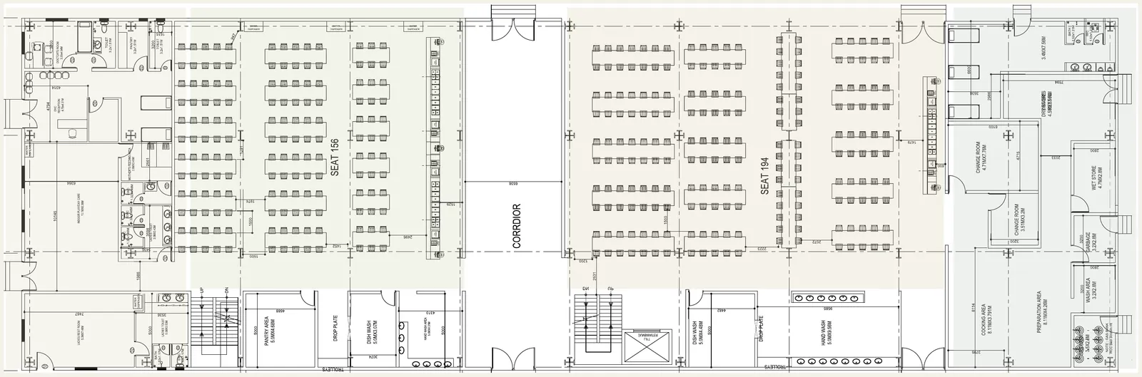 Furnished ground-floor plan of a canteen with two dining halls either side of a corridor, servery, kitchen and welfare rooms