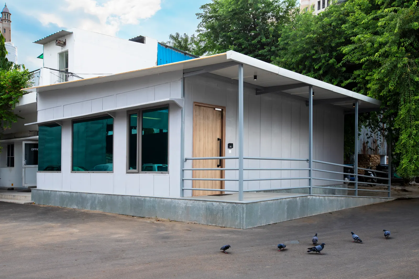 Side view of the Imperial Malts pre-engineered office building with its cantilevered steel roof