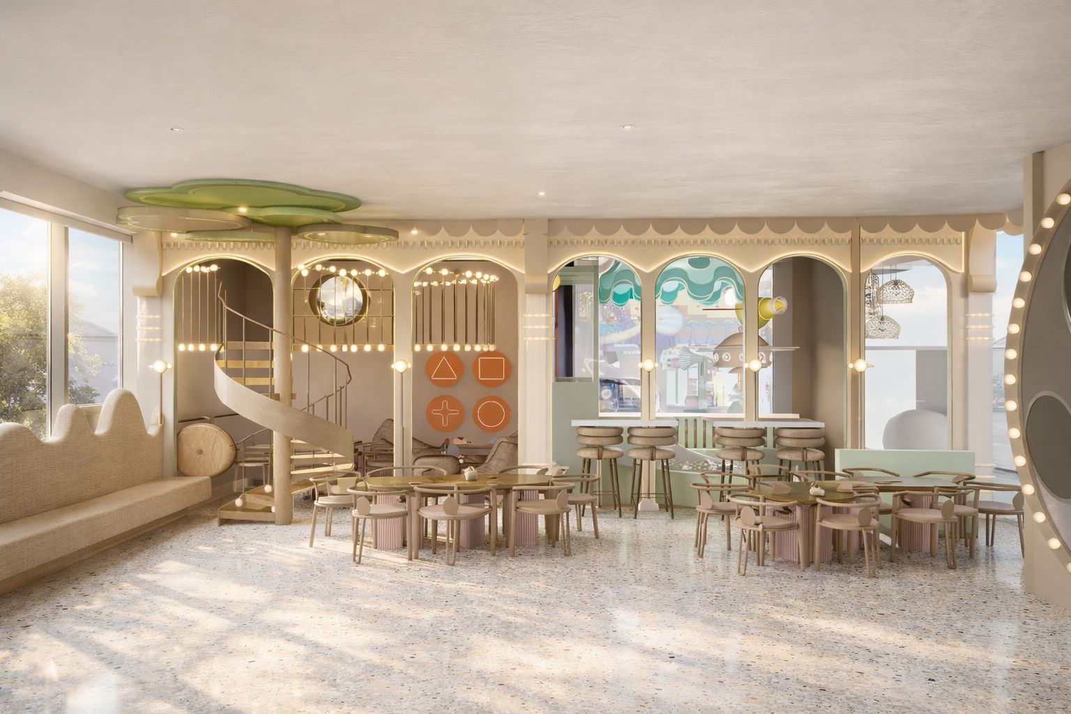Kokko Town café lounge with spiral staircase and shape-matching activity wall overlooking the arcade