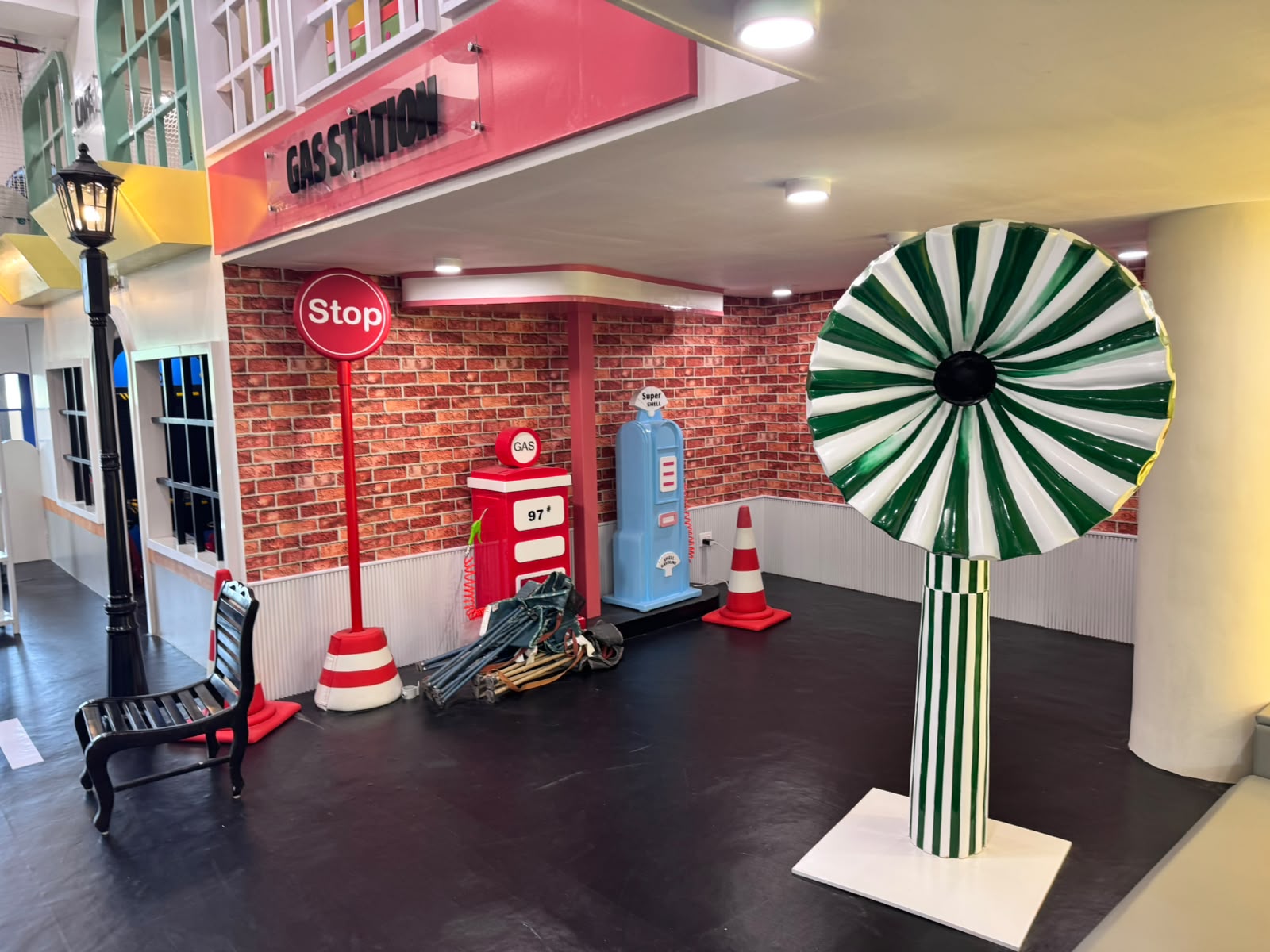 Kokko Town Gas Station pretend-play area with fuel pumps and a lollipop-shaped street lamp