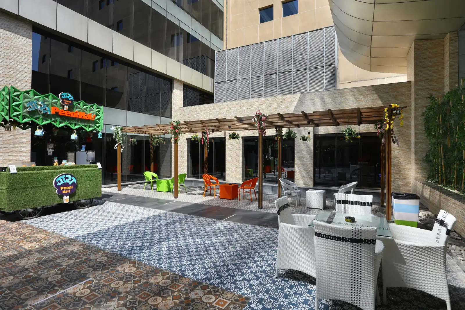 SP Infocity courtyard seating under a timber pergola