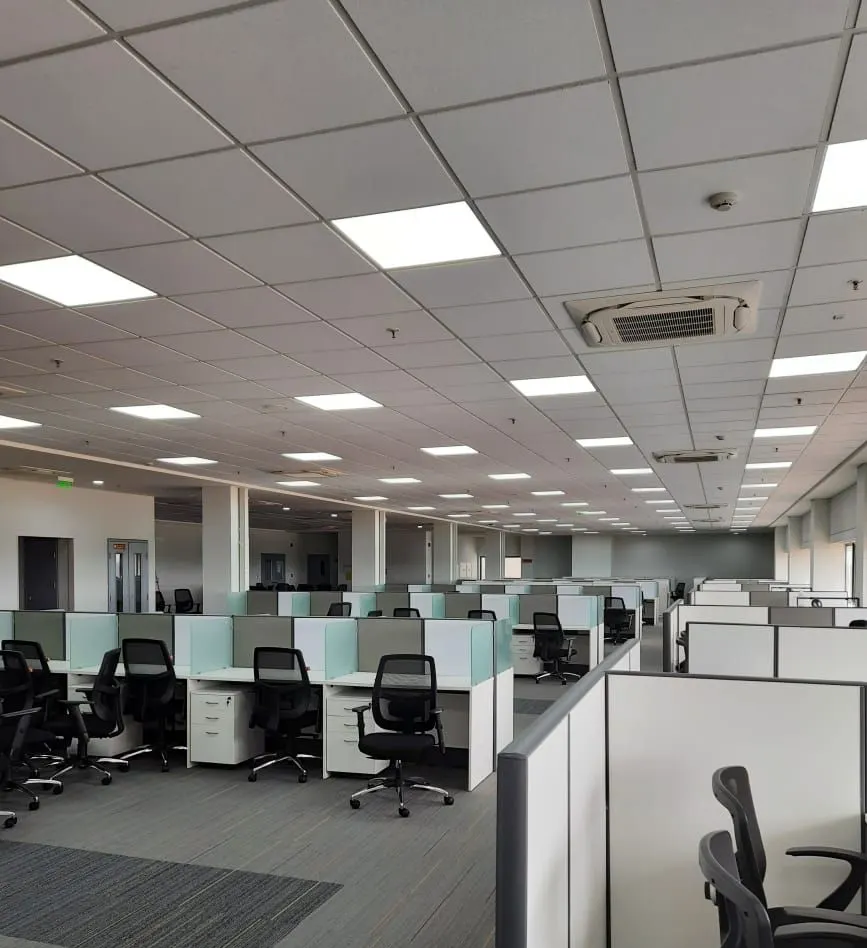 Yanmar engine factory office in Ponneri with rows of workstations under a grid ceiling